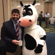 Marigold cow mascot and Mayor Dan Drew