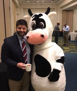 Marigold cow mascot and Mayor Dan Drew